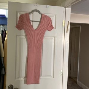 Never worn pink midi dress. Perfect color and material to show off curves.